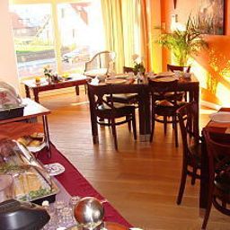 Salle du petit-déjeuner située dans le restaurant Pension de Watertoren Fotos