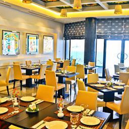 Salle du petit-déjeuner située dans le restaurant Serene Landmark Fotos