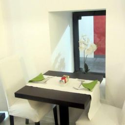 Salle du petit-déjeuner La Contrada Fotos