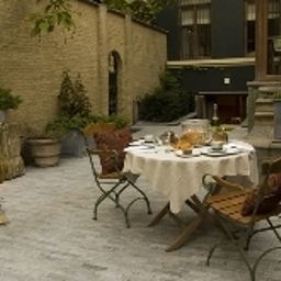 Terrasse Hotel Le Tissu Fotos