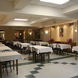 Sala colazione nel ristorante Casa Santa Rosa Fotos
