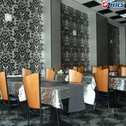 Salle du petit-déjeuner située dans le restaurant Sunrise Apart Hotel Fotos