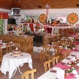 Frühstücksraum im Restaurant Pension Hollyday Die grüne Oase Fotos
