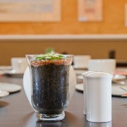 Salle du petit-déjeuner située dans le restaurant Namib Guesthouse Fotos