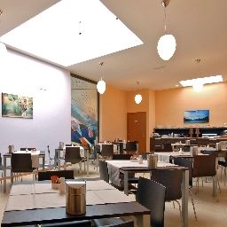 Salle du petit-déjeuner Rosso Frizzante Fotos