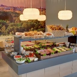 Salle du petit-déjeuner Meininger Airport Fotos