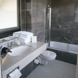 Badezimmer l'Arrivée HOTEL & SPA Fotos
