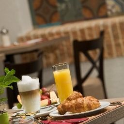 Sala de desayuno en el restaurante Estilo Fashion Hotel Budapest Fotos
