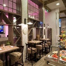 Sala de desayuno en el restaurante Estilo Fashion Hotel Budapest Fotos