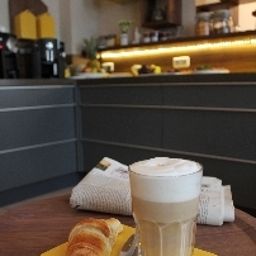 Salle du petit-déjeuner Stadthaus Fotos