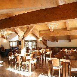 Salle du petit-déjeuner située dans le restaurant Aparthotel Rialb Andorra Fotos