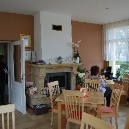 Salle du petit-déjeuner Burghof Fotos
