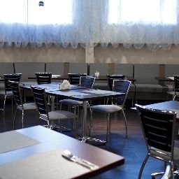 Sala de desayuno en el restaurante SkyPoint Fotos