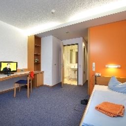 Chambre pour voyageurs d'affaires Akademie des Sports Fotos