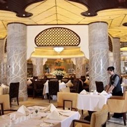 Salle du petit-déjeuner située dans le restaurant Xinjiang Hotel - Beijing Fotos