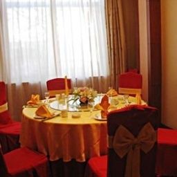 Salle du petit-déjeuner située dans le restaurant Ji'nan Luliang Business Hotel Fotos