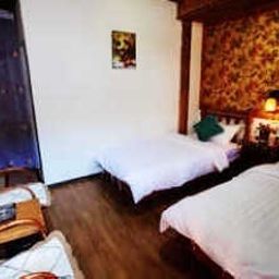 Chambre Bird of Paradise Inn - Lijiang Fotos